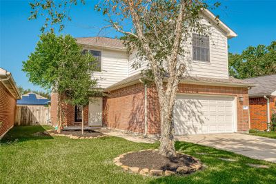 Welcome to 18339 Beaverdell Drive in Tomball! Excellent curb appeal as you pull into the driveway | Image 1