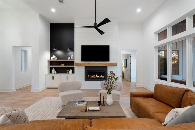 14ft+ ceilings in this one story 5 bedroom stunner! Open concept floorplan that is a WOW as soon as you walk through the front door. | Image 6