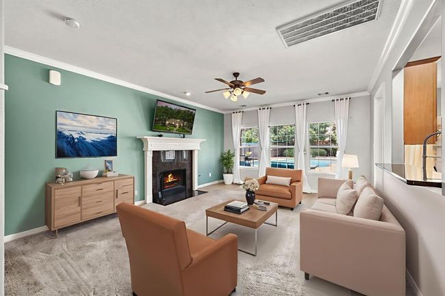This image has been virtually staged so you can see a possible furniture layout for your new home. | Image 11