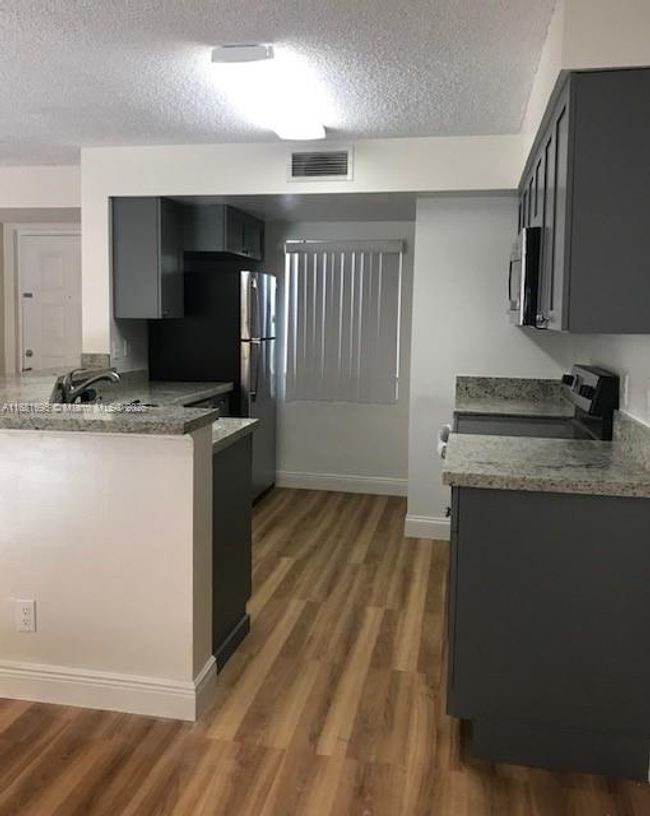 APT-414 - 9999 Summerbreeze Dr, Condo with 1 bedrooms, 1 bathrooms and null parking in Sunrise FL | Image 7