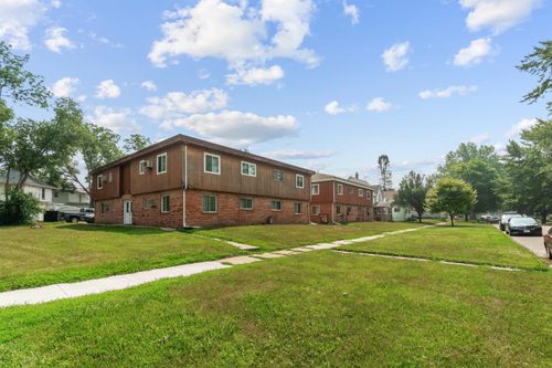 215-209-215 Baltimore St, Waterloo, IA, 50701-2675 | Card Image