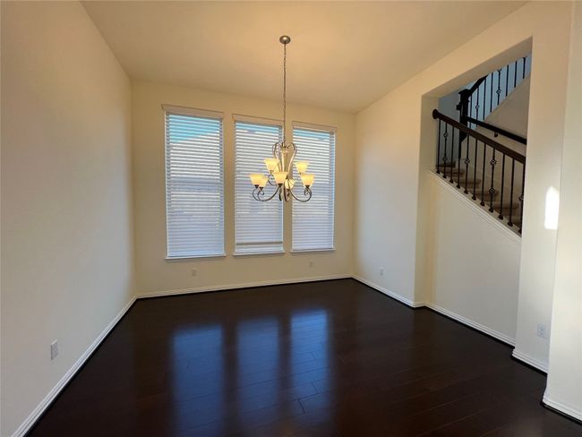 Formal Dining area with beautiful wood floors | Image 11