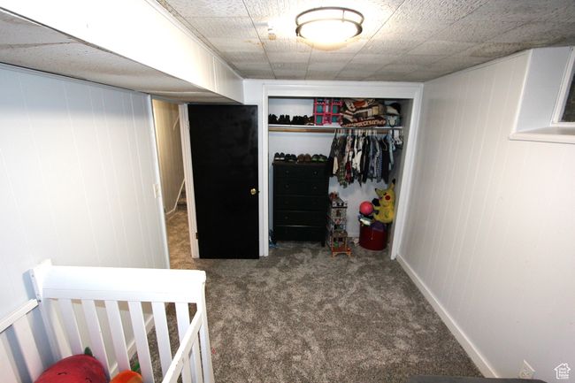 Bedroom featuring carpet flooring and a closet | Image 29