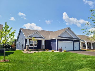 Gorgeous kitchen with large center island and nice pantry for storage. Photo of Model Home. Options and colors may vary. Ask Sales Agent for details. | Image 2