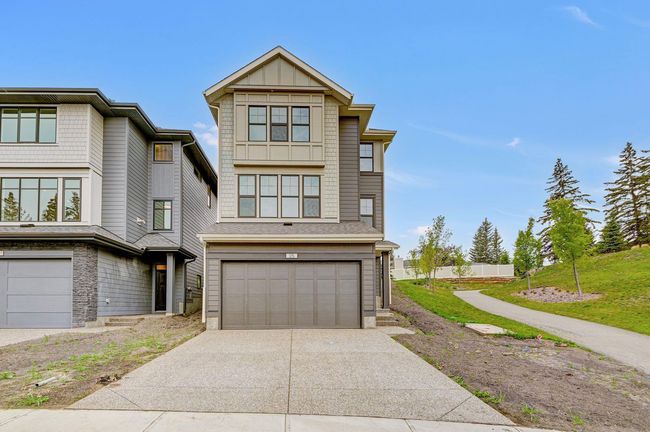25 Shawnee Green Sw, Home with 3 bedrooms, 2 bathrooms and 4 parking in Calgary AB | Image 1
