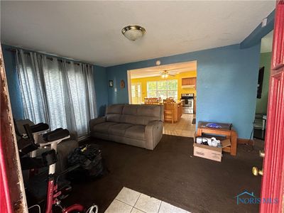 Family Room from front door leading into the kitchen. | Image 2