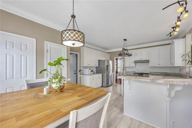 225 Ruby Forest Pkwy, House other with 4 bedrooms, 3 bathrooms and 5 parking in Suwanee GA | Image 17
