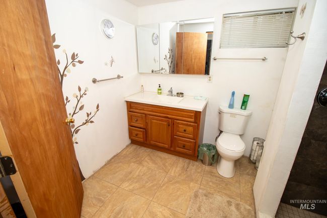 Bathroom featuring vanity and tile patterned floors | Image 36