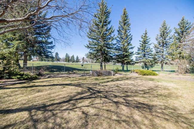 249 Fairway Drive, Home with 4 bedrooms, 3 bathrooms and 5 parking in Coaldale AB | Image 4