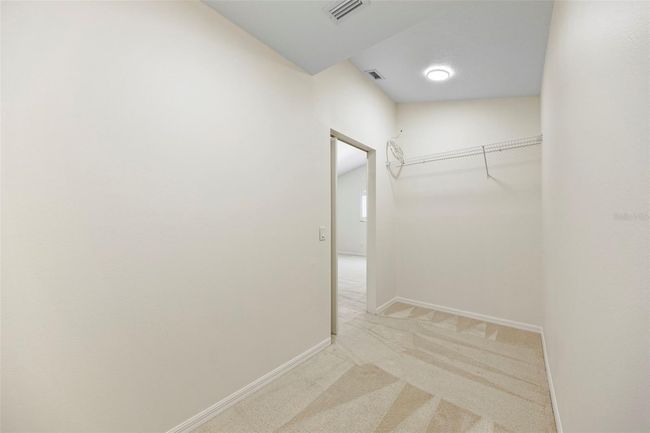 Large upstairs walk in storage closet. | Image 42