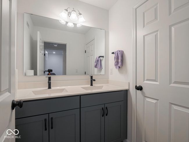 bathroom featuring double vanity and a sink | Image 46