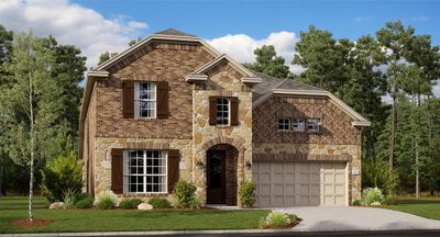 View of front of home with a garage and a front lawn | Image 1