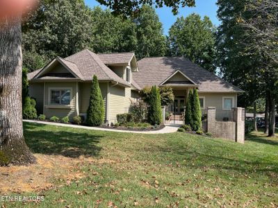 One Level Lakefront House on a Level Lot with a Boat Dock | Image 1