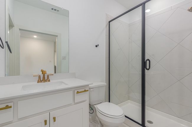 Full bath featuring vanity and a shower stall | Image 23