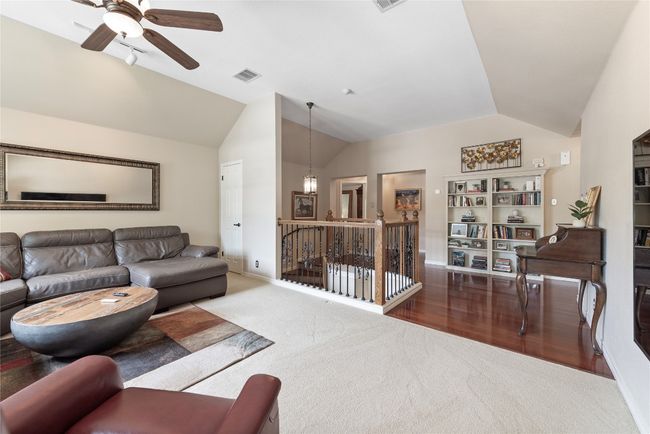 Upstairs living area-ideal as a game room or playroom for younger members of the household. | Image 21