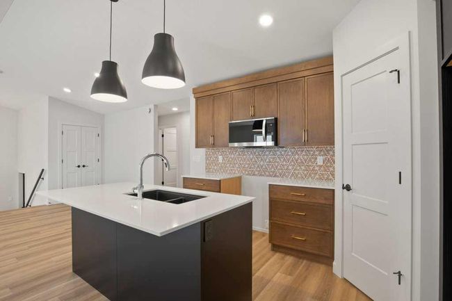 154 Norseman Close, House other with 4 bedrooms, 3 bathrooms and 4 parking in Penhold AB | Image 5