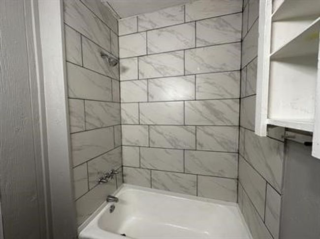 Bathroom featuring shower combination | Image 9
