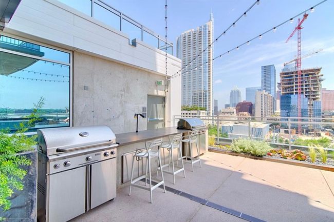 View of patio featuring a view of skyline | Image 25
