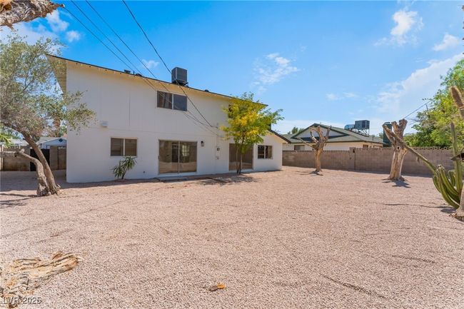 Back of property featuring a fenced backyard | Image 53