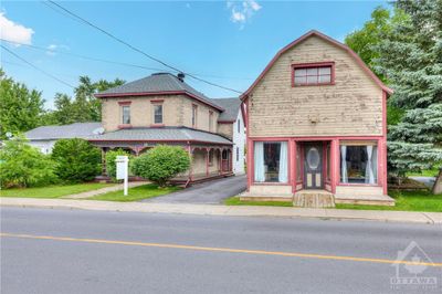 Century home with detached garage and shop | Image 1