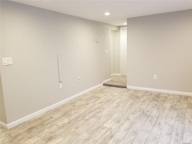 Empty room featuring recessed lighting, light wood-style floors, and baseboards | Image 15