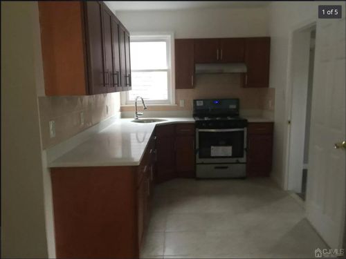 423 Augustine Pl, Perth Amboy, NJ, 08861-3618 | Card Image