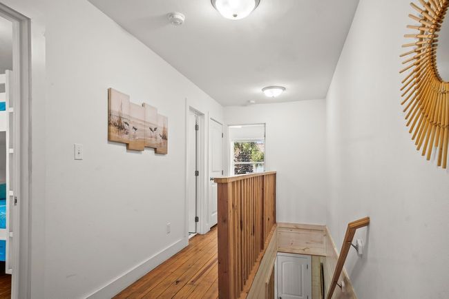 Upstairs hall into the 3 bedrooms and bath off hallway | Image 22