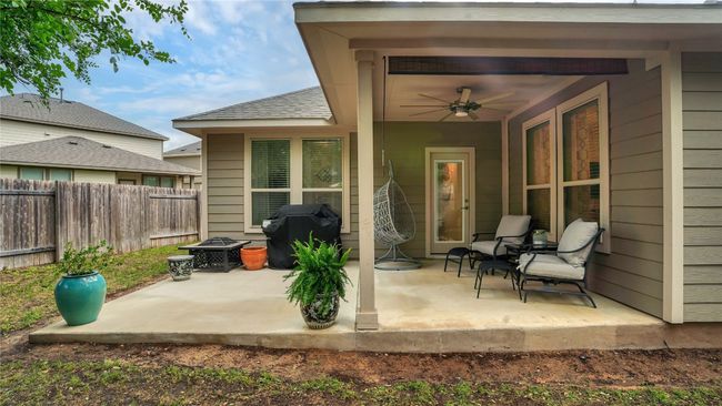 View of patio featuring fence, a ceiling fan, and a grill | Image 30