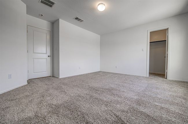 Unfurnished bedroom featuring carpet and baseboards | Image 21