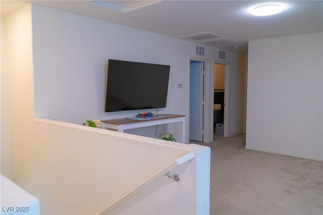 Living room featuring light colored carpet and visible vents | Image 37
