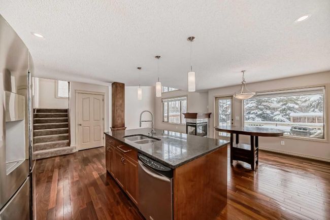 1A Tusslewood Drive Nw, Home with 3 bedrooms, 2 bathrooms and 4 parking in Calgary AB | Image 11