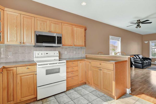 12301 Crystal Lake Dr, House detached with 4 bedrooms, 3 bathrooms and 6 parking in Grande Prairie AB | Image 9