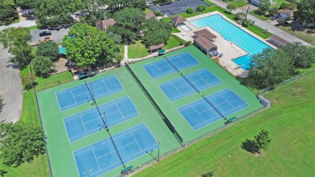 The community sports complex features a versatile court designed for tennis, pickleball, and volleyball, giving residents plenty of ways to stay active. | Image 24