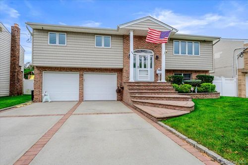 56 Empire Blvd, Island Park, NY, 11558-1228 | Card Image