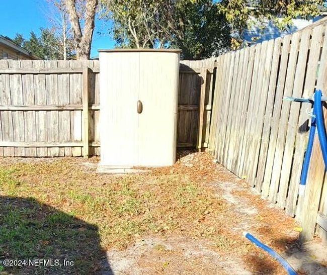 11775 Blueberry Ln, House other with 3 bedrooms, 2 bathrooms and null parking in MACCLENNY FL | Image 45