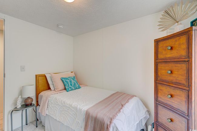 Bedroom with light colored carpet | Image 22