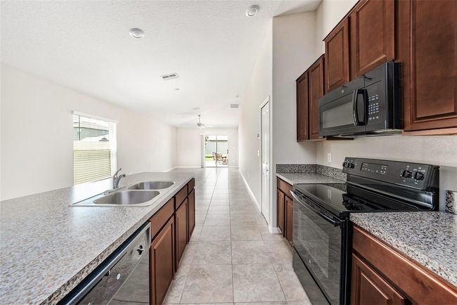 7211 Ozello Trail Ave, House other with 3 bedrooms, 2 bathrooms and null parking in SUN CITY CENTER FL | Image 11