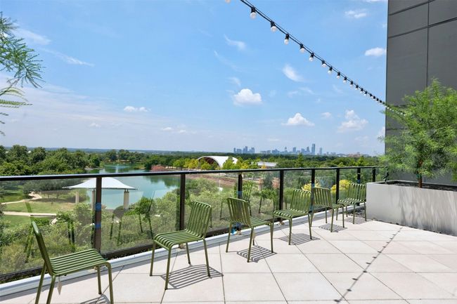 Balcony with a skyline view | Image 32