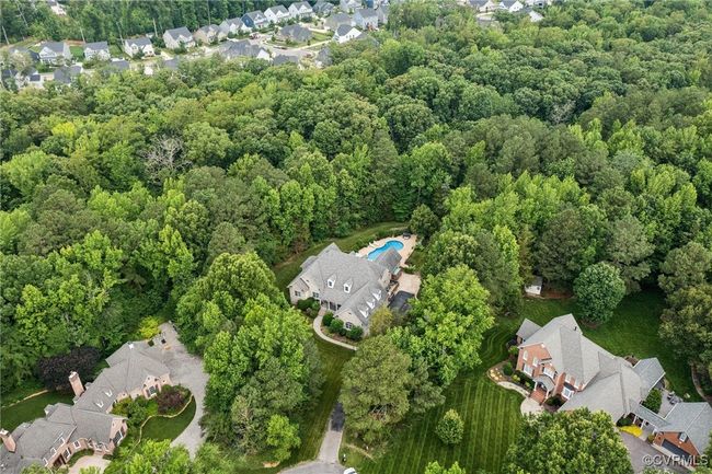 Property backs to 42.6 acre protected parcel owned by Tarrington HOA where Salles Creek is located | Image 44