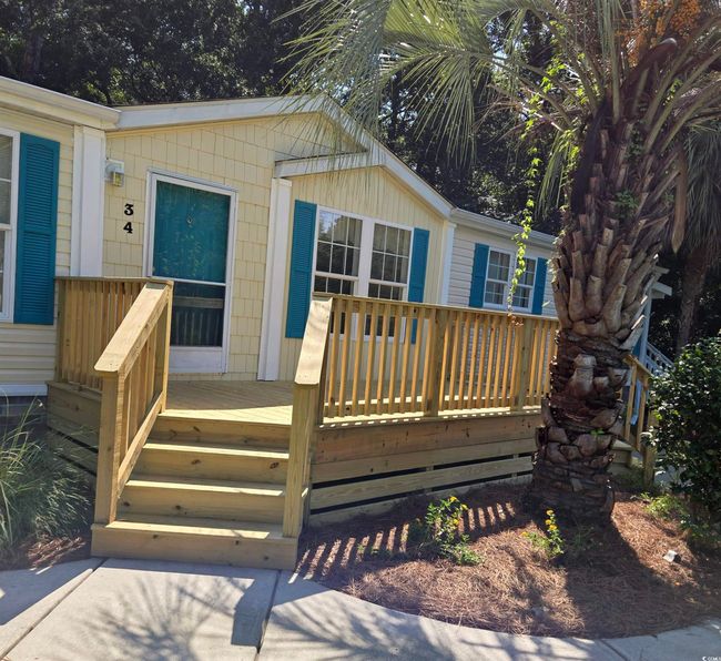 Entrance to property featuring a deck | Image 7