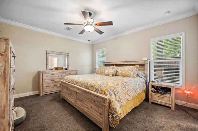 The primary features lots of space and the crown molding that is throughout the rest of the home! Lots of extras went into this home! | Image 19