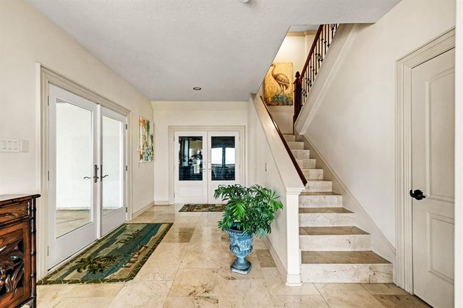 entryway from ground level (can either take the stairs or the elevator from garage/ground level | Image 45