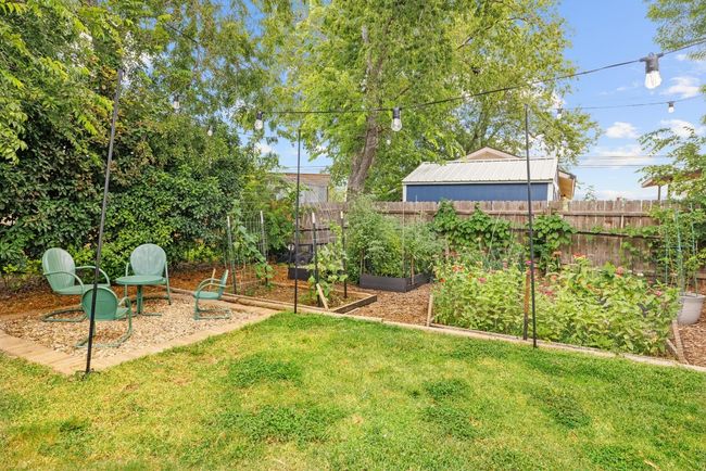 View of backyard with a vegetable garden | Image 22
