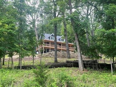 **New Construction!** Surrounded by trees and nature! Great walking trails, view of lake! | Image 1