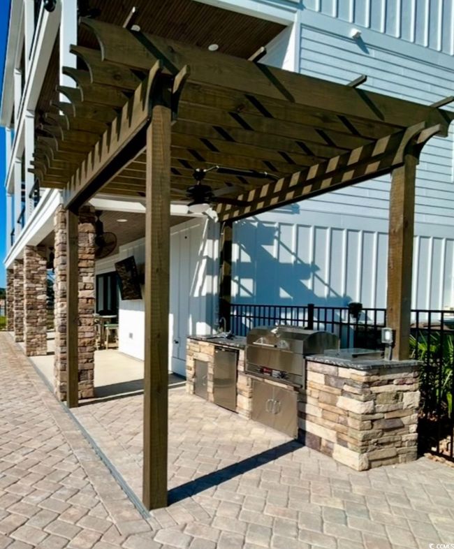 Optional Pergola & Outdoor Kitchen Upgrade with Grill, Fridge, Storage Door, and Side Burner | Image 12