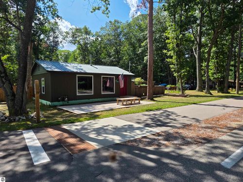 2010 W River Rd, Oscoda, MI, 48750-9048 | Card Image