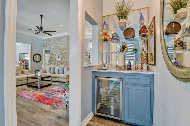 Wet bar with copper sink and built in fridge | Image 18