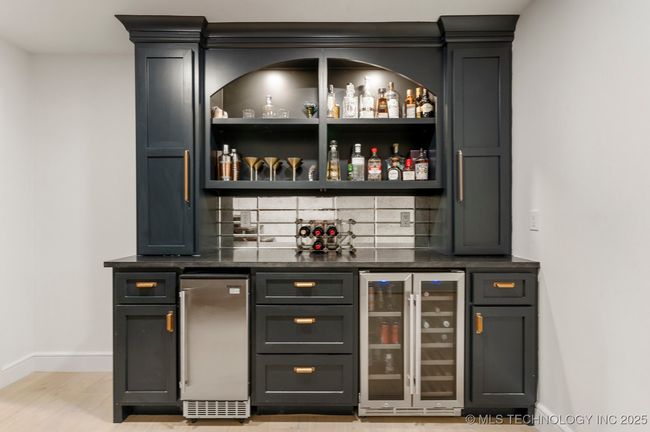 Wet bar outside the formal office | Image 34