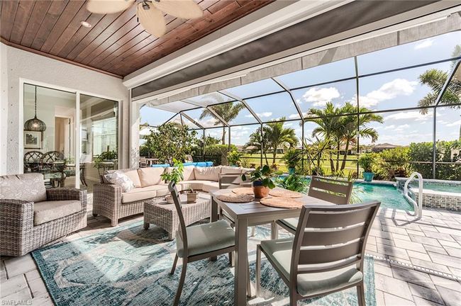 Covered lanai with outdoor grill | Image 39