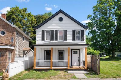 View of front of property with a front yard and a porch | Image 2